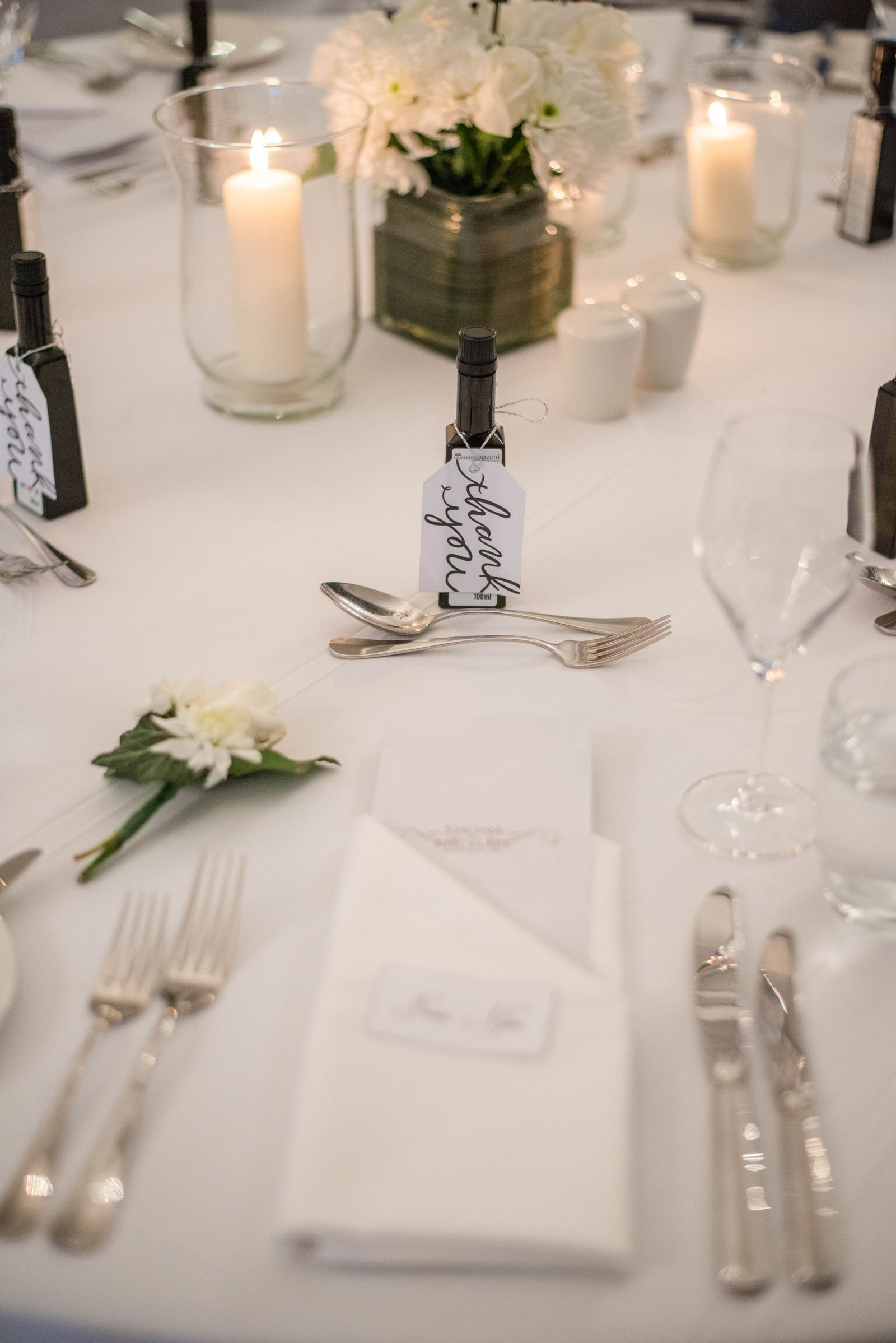 Banquet table with white flowers and candles